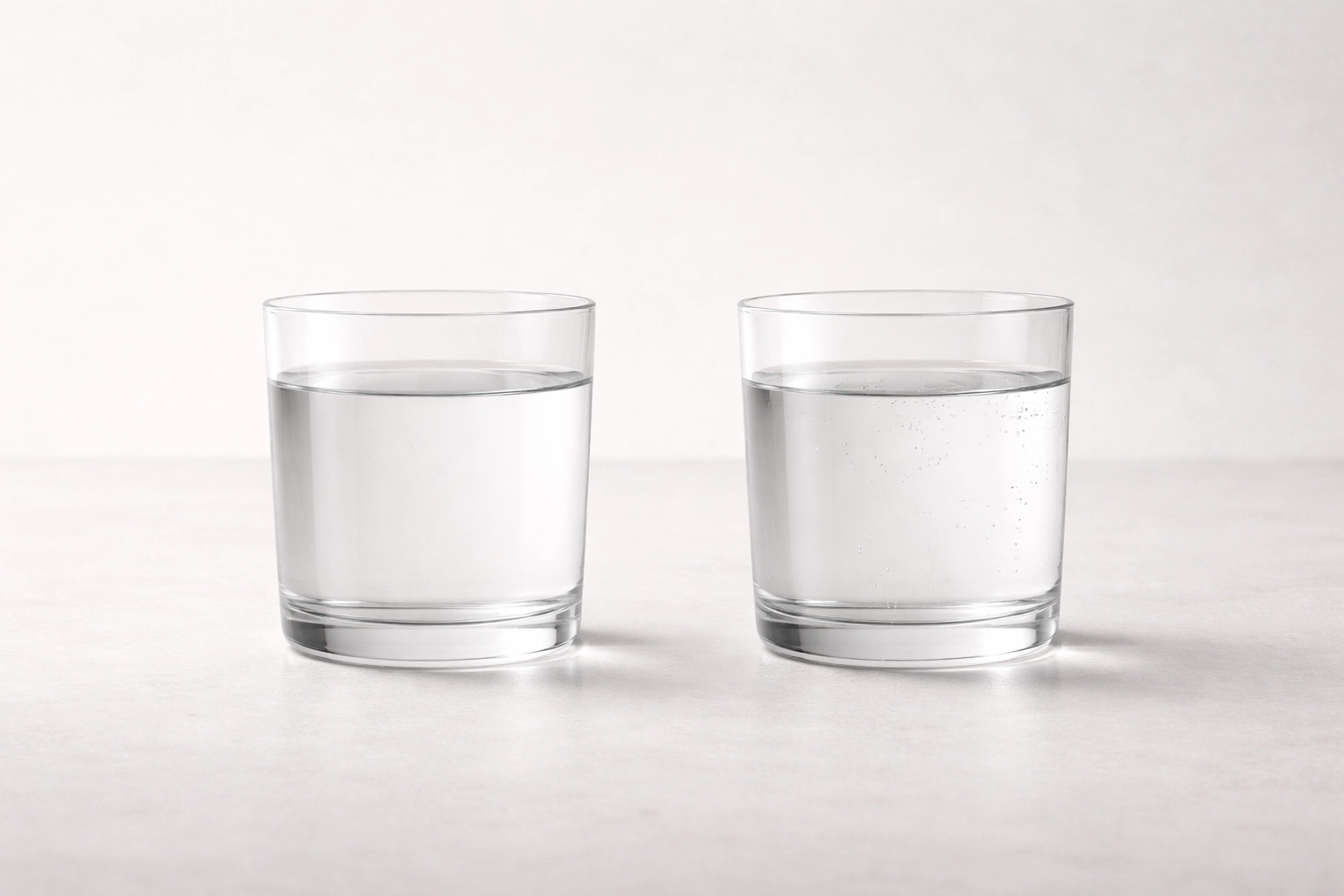 Comparison image with two glasses of water for Aquathrive LX review in Canada
